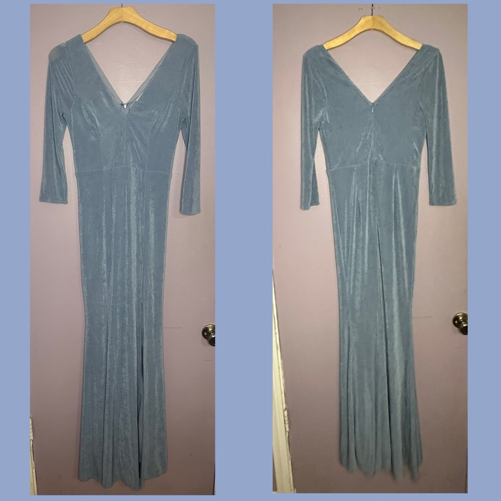 Light blue 3/4 sleeve, v-neck, high slit gown. Size M New excellent condition